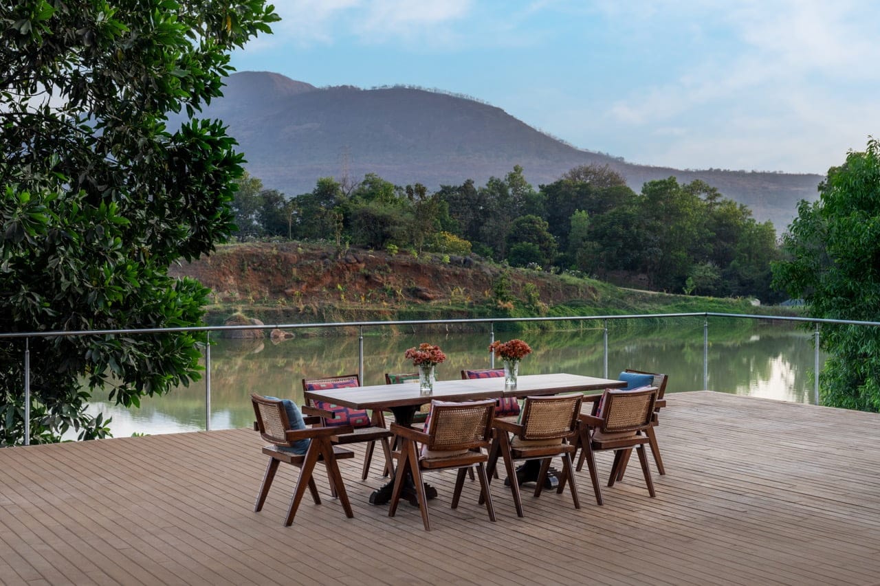 Guests meditating in a peaceful natural setting