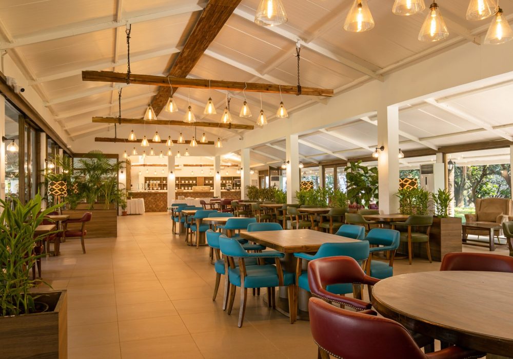 Guests walking amidst natural greenery