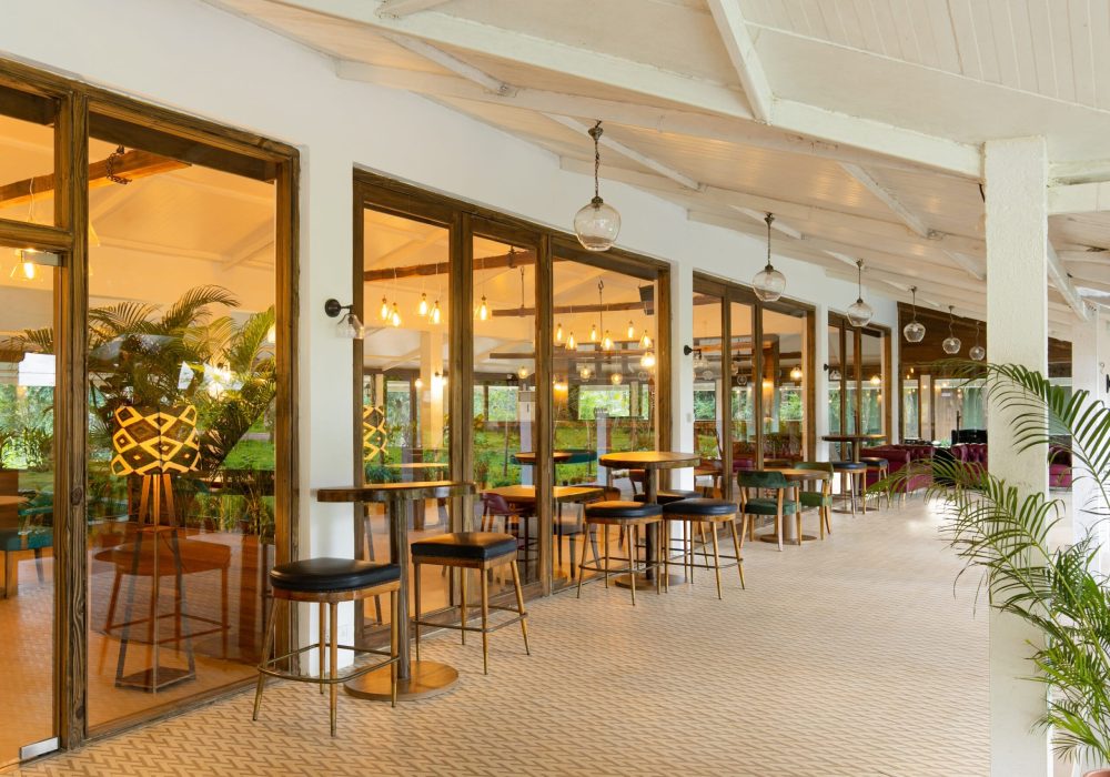 Guests walking amidst natural greenery