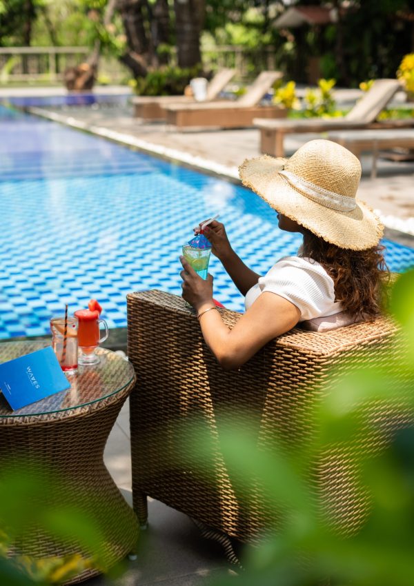 Infinity pool surrounded by greenery in Karjat